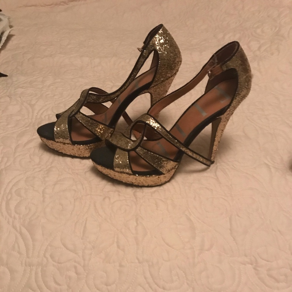Black and gold heels